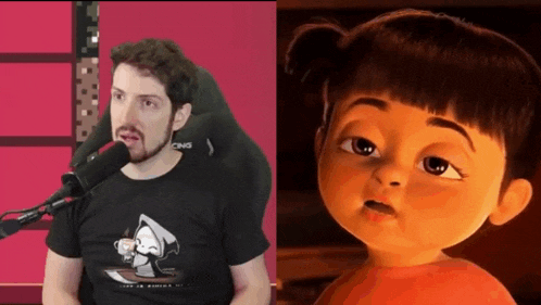 a man talking into a microphone next to a little girl