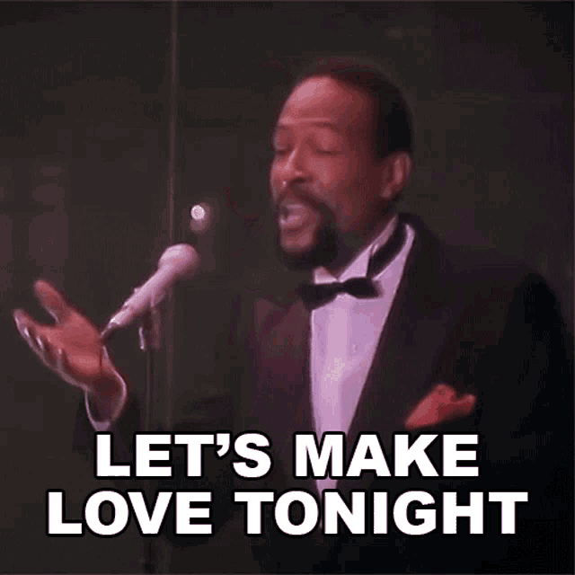 a man in a tuxedo singing into a microphone with the words let 's make love tonight