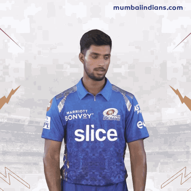a man is wearing a blue shirt with the word slice on it