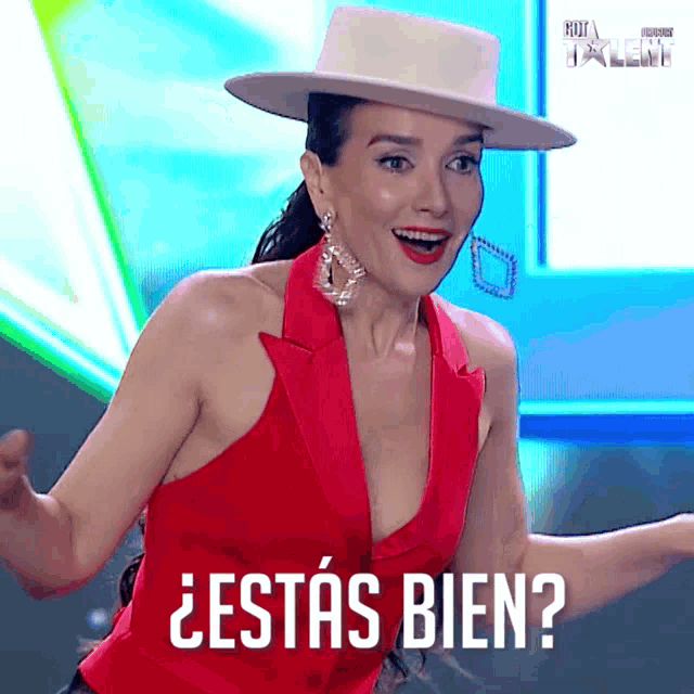 a woman wearing a red top and a white hat is asking if she is ok
