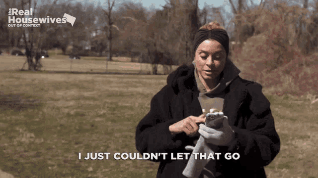 a woman holding a stuffed animal says i just couldn t let that go