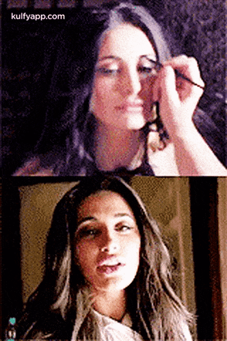 a woman is applying mascara to her eye while another woman looks on