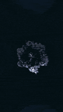 a group of people are standing in front of a purple background with a splash of water coming out of the middle