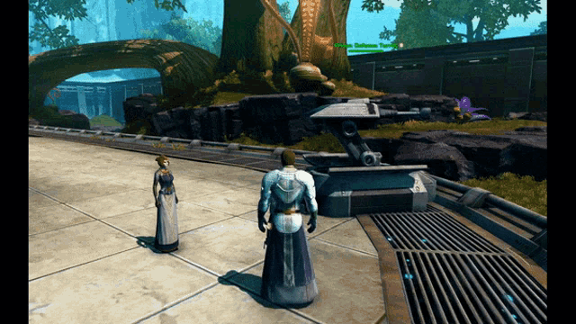 a man and a woman are standing in a video game with the word defense tower visible