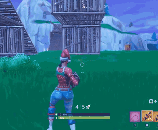 a person in a santa hat is playing a video game and has a score of 4 5