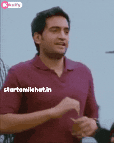 a man in a maroon shirt is running with the words starttamilchat.in written on the bottom