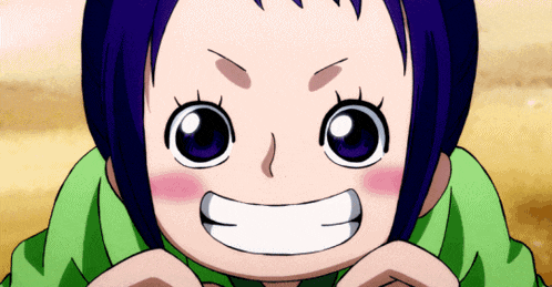 a girl with purple hair is smiling with her hands on her chin