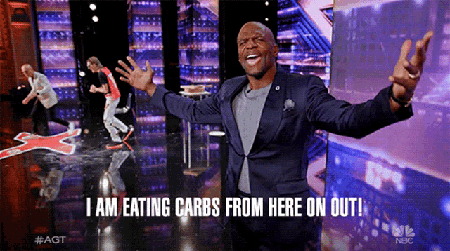 a man in a suit says " i am eating carbs from here on out ! "