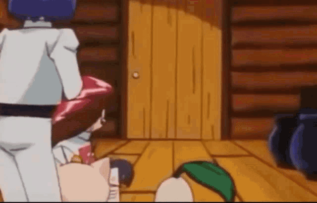 a couple of cartoon characters are standing next to each other in front of a wooden door .
