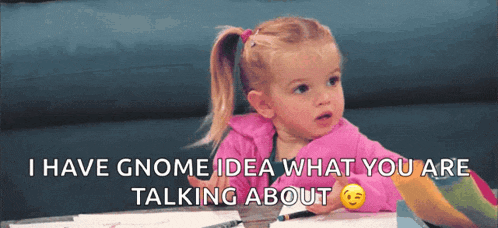 a little girl is sitting at a table with a smiley face and the words i have gnome idea what you are talking about