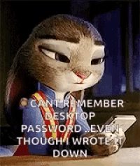 judy hopps from zootopia is sitting at a desk looking at her cell phone .