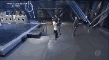 a group of people are standing on a stage with the word brasil on the bottom left