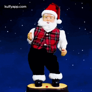 a figurine of santa claus is dancing in front of a blue background