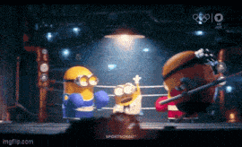 a group of minions are boxing in a ring with a sign that says sportsschau
