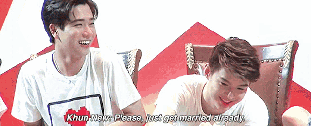 two young men are sitting next to each other and one of them says " khun new please just get married already "