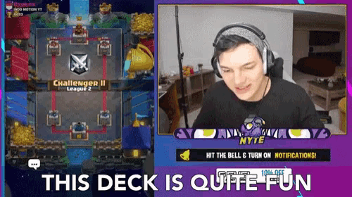 a man playing a video game with the words this deck is quite fun behind him