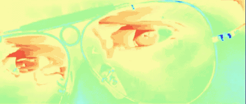 a close up of a woman 's eye in a colorful painting