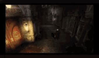 a blurry picture of a dark alleyway with a light shining through a window .