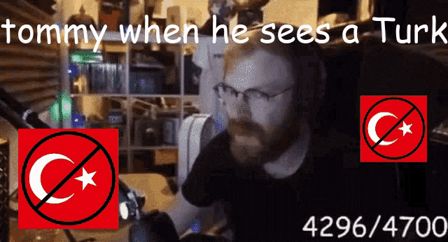 a tommy when he sees a turk poster with a man in glasses