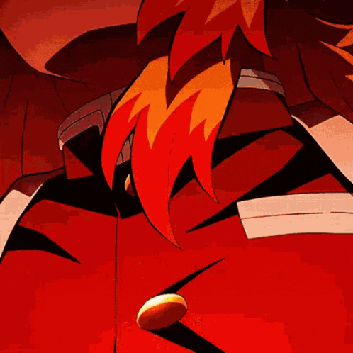 a close up of a person 's eyes with red eyes and a fire coming out of them .