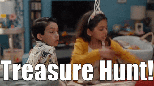 a boy and a girl are playing a game and the girl is wearing a headband that says treasure hunt .