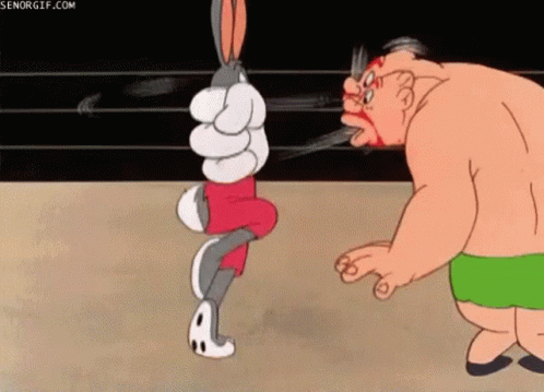 Mad Bugs Bunny GIF - Mad Bugs Bunny Fight GIFs