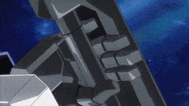 a close up of a robot with a blue sky behind it