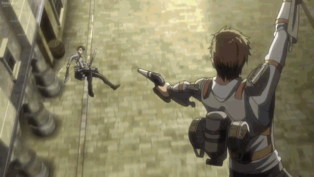 a man is holding a gun in front of another man who is laying on the ground