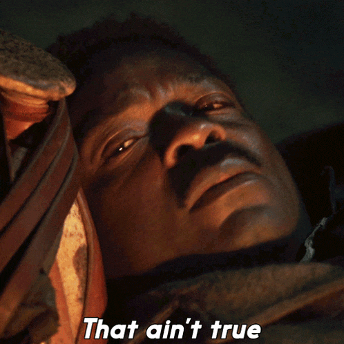 a close up of a man with the words that ain 't true below him