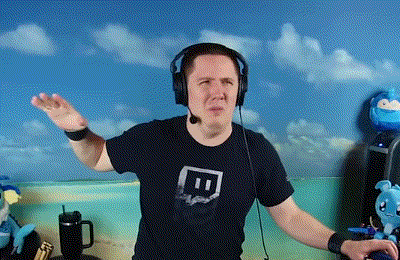 a man wearing headphones and a t-shirt with the letter t on it