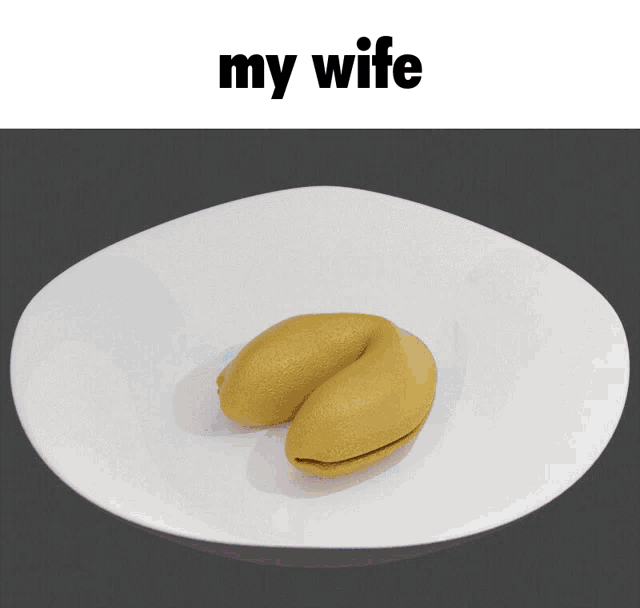 a yellow fortune cookie on a white plate with the words " my wife " below it