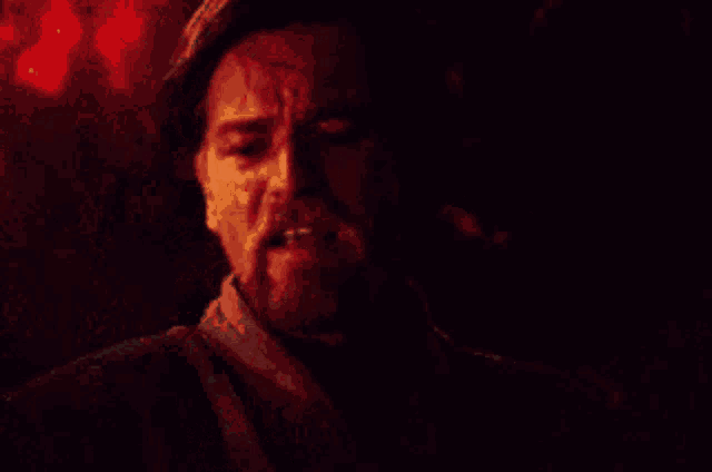 a man with a beard says " you were the chosen one " in a dark room