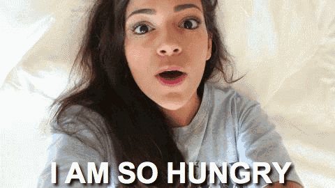 a woman with a surprised look on her face and the words i am so hungry above her