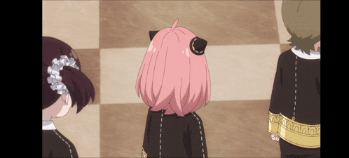 a girl with pink hair has a black cat ear
