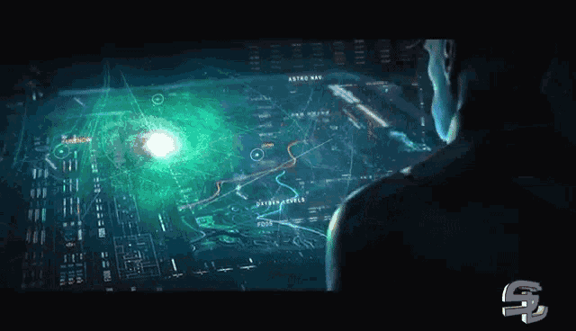 a man looking at a map with the letter s on the bottom right