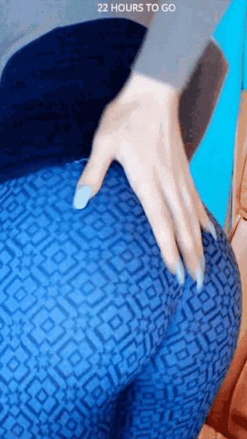 a picture of a woman 's butt with the words " 22 hours to go " visible