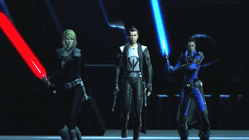 a group of three people holding lightsabers in a dark room