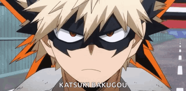 a close up of a cartoon character wearing a mask and the name katsuki bakugou