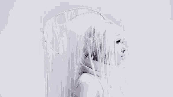 a woman with long white hair is wearing a veil