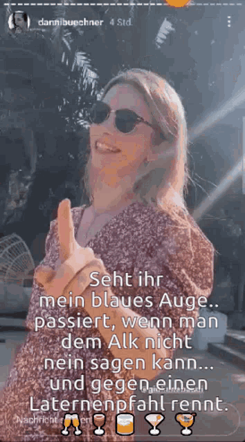a woman wearing sunglasses is giving a thumbs up in a german language