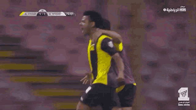 a soccer player with the number 36 on their back
