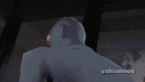 a man wearing a mask says any in front of a yahiamice logo
