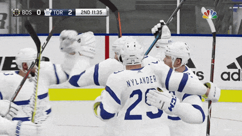 nylander # 25 celebrates with his teammates after scoring a goal against the toronto maple leafs