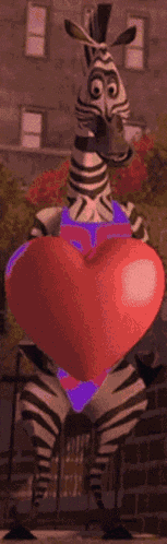 a cartoon zebra is holding a heart in his hands