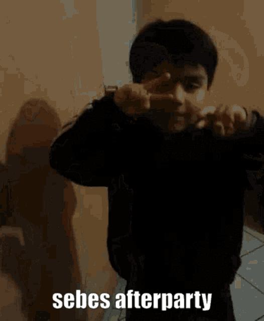 a young boy is making a peace sign with the words sebes afterparty written below him