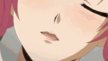 a close up of a person 's mouth with fangs