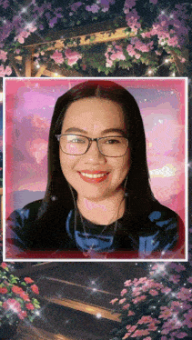a woman wearing glasses is smiling in front of a pink and purple background