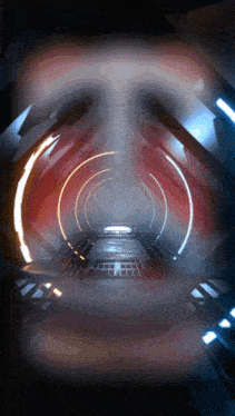 an animated image of a futuristic tunnel with a glowing light at the end
