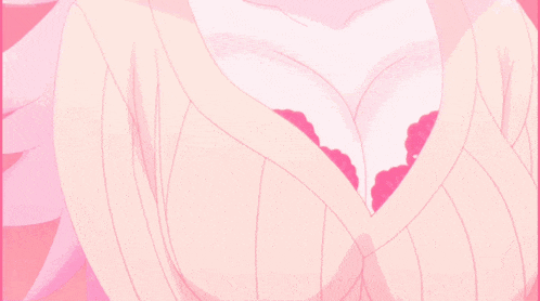a woman 's breasts are visible in a pink bra