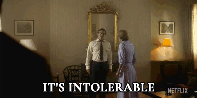a man and woman standing in front of a mirror with the words " it 's intolerable " below them